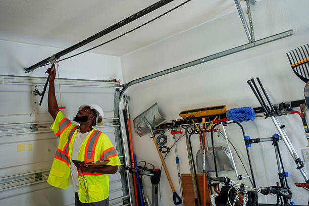 Professional Garage Door Panel Replacement technician working in Two Rivers, WI